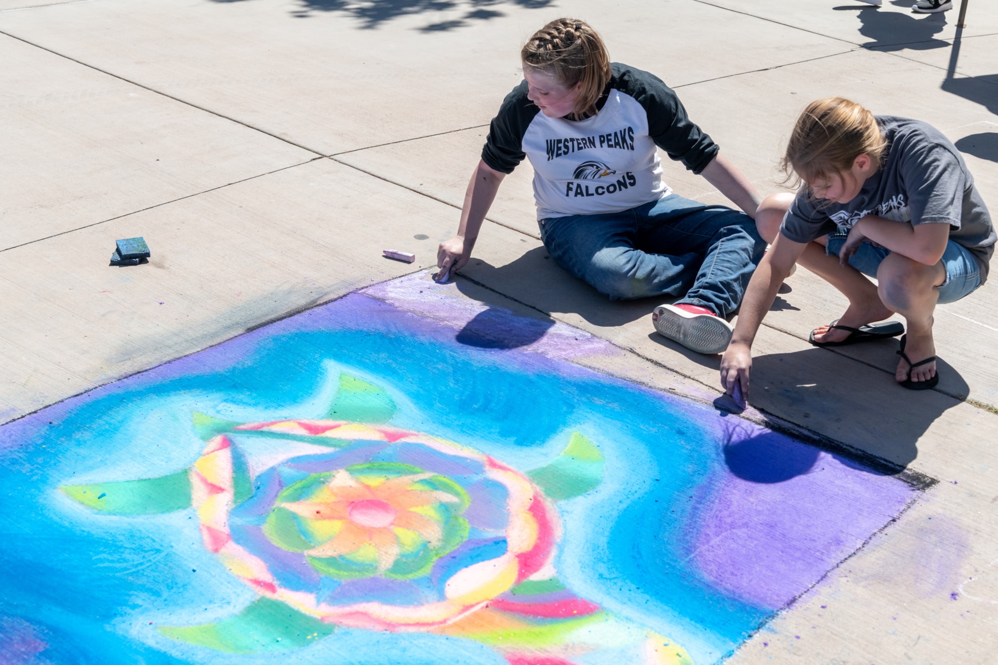 Students working on chalk art