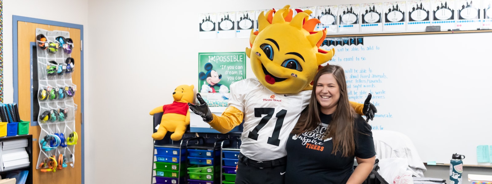 Mrs. Reagan with the Fiesta Bowl mascot.