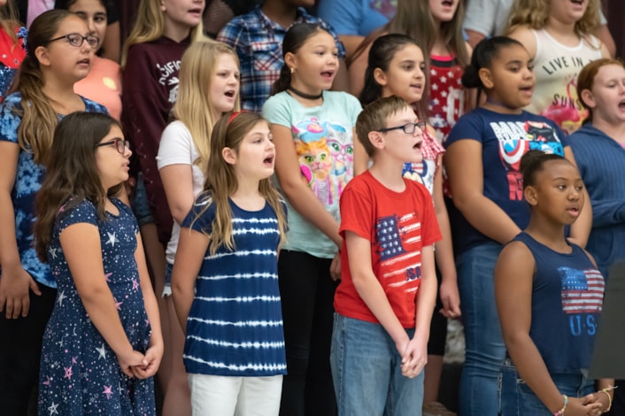 choir students singing at an event