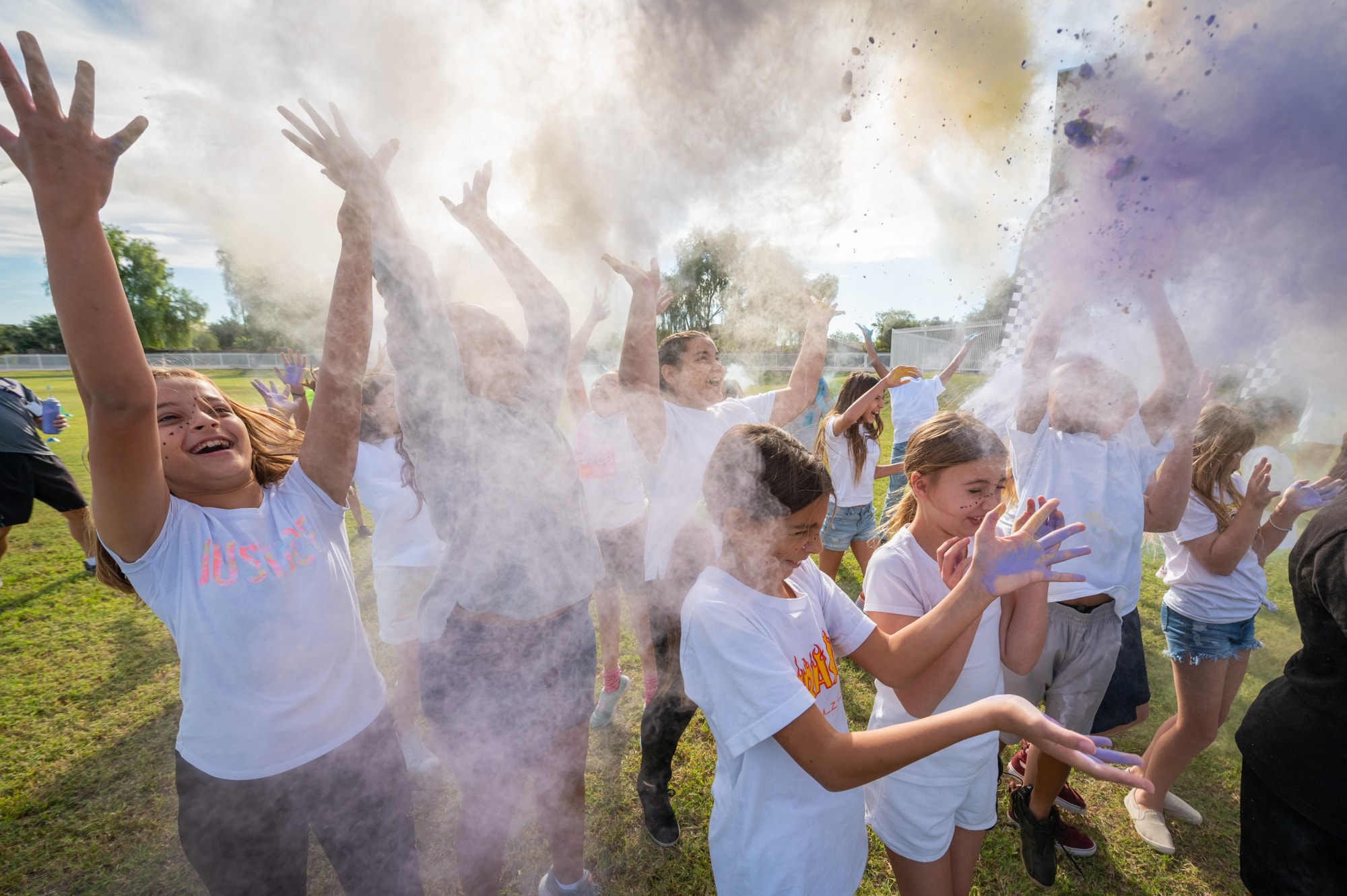 running students through colored powder
