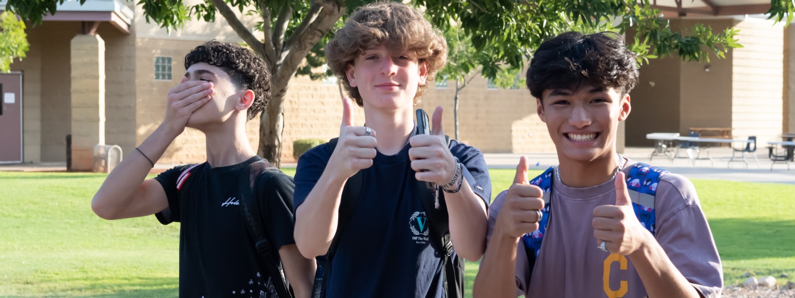 Students give a thumbs up
