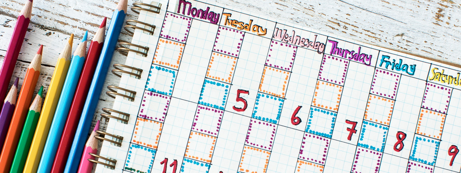 Calendar and colored pencils 