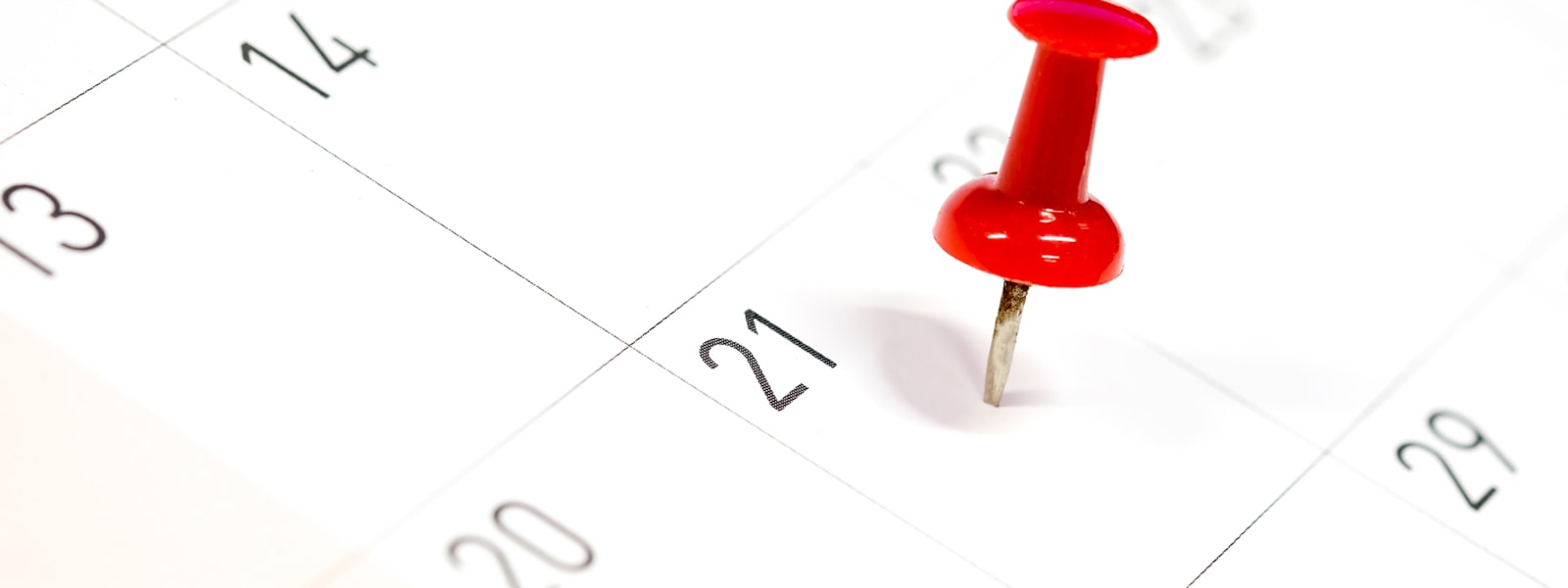Push pin marking a date on the calendar