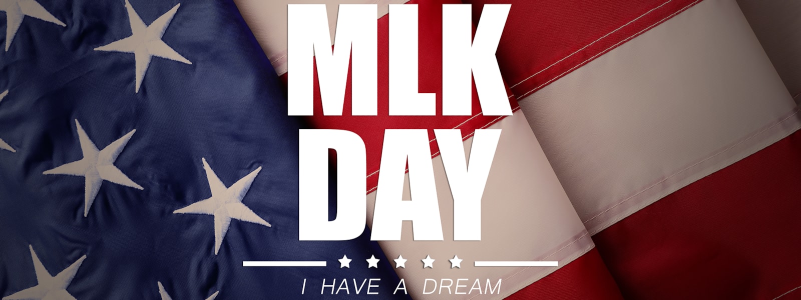 Flag with MLK DAY written over it