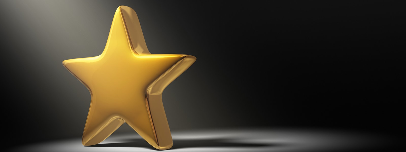gold star on a black background