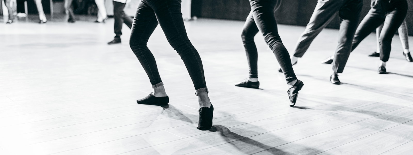 legs and feet of students dancing