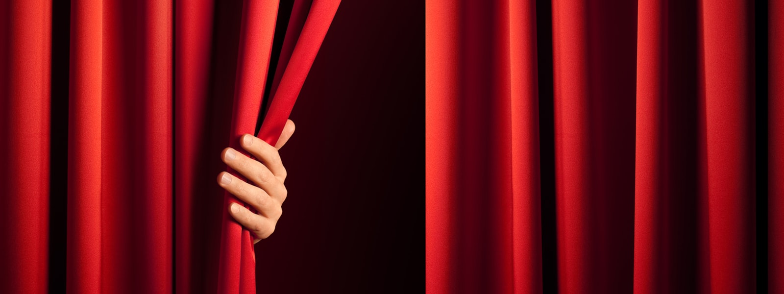 person opening Curtain