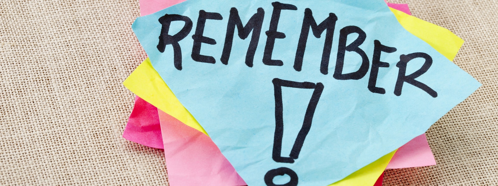 postit notes with the word remember
