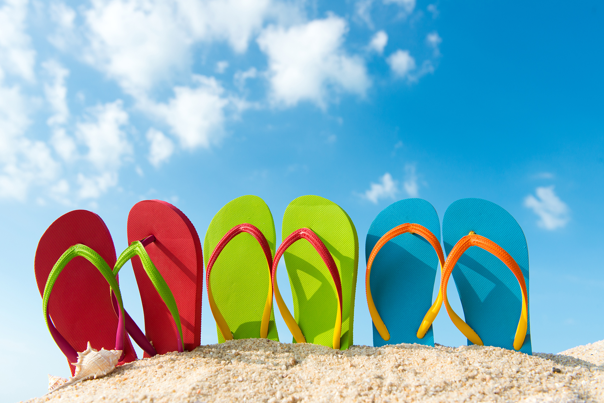 image of flip flop and blue skies