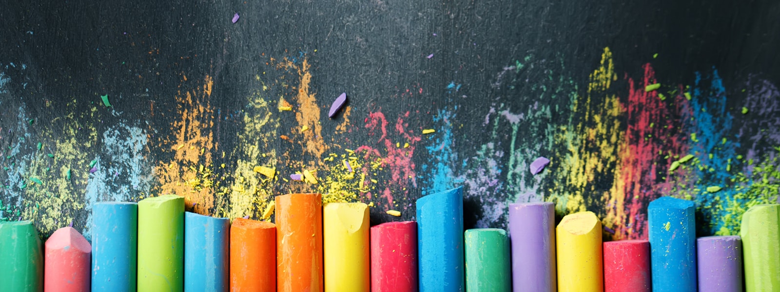 colorful chalk on chalkboard