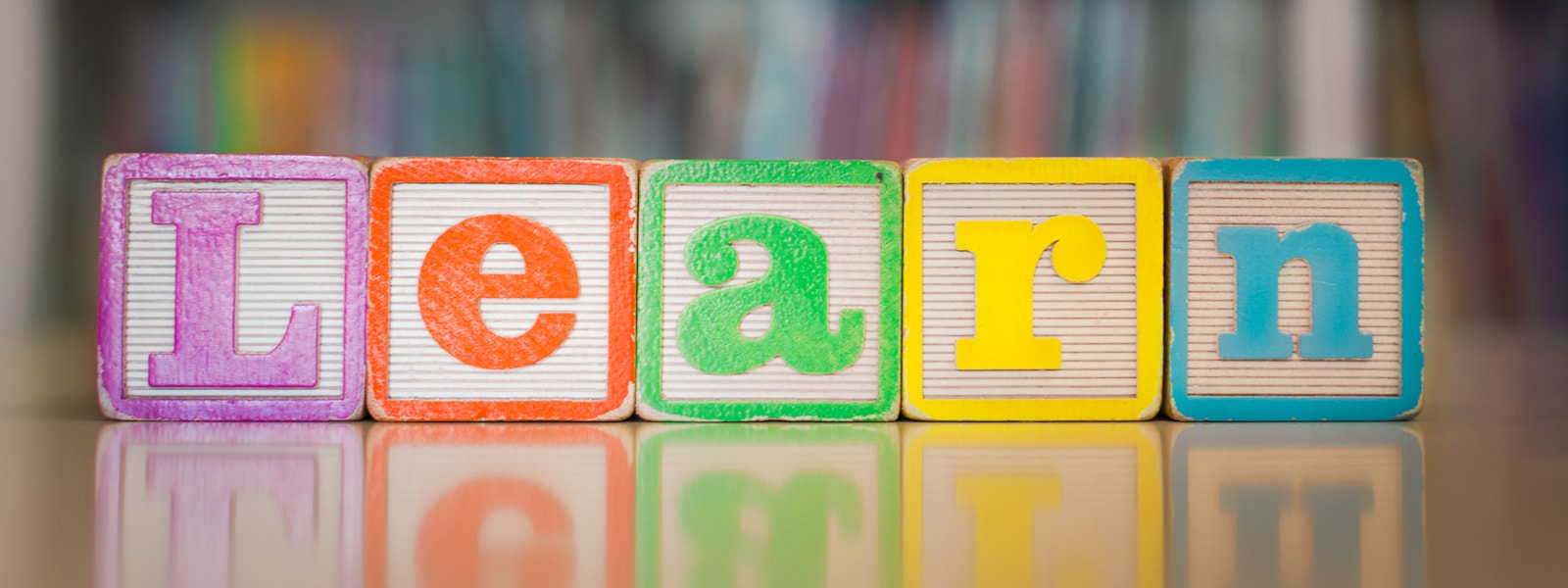 Letter blocks that spell out the word "Learn"