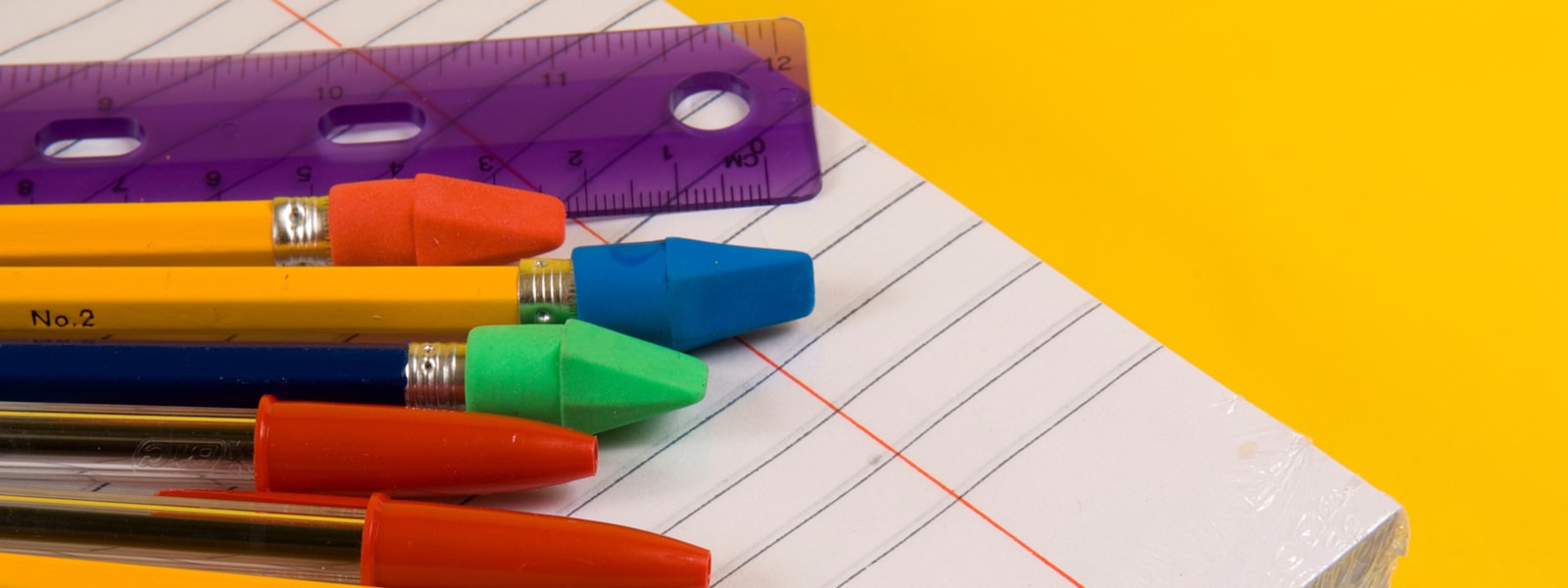 pens, pencils, ruler, and paper