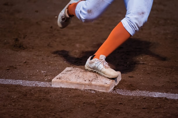 foot rounding base in softball game