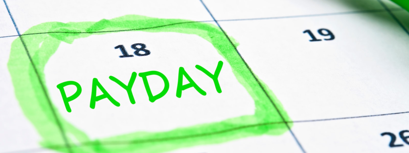 calendar with payday written on it in green
