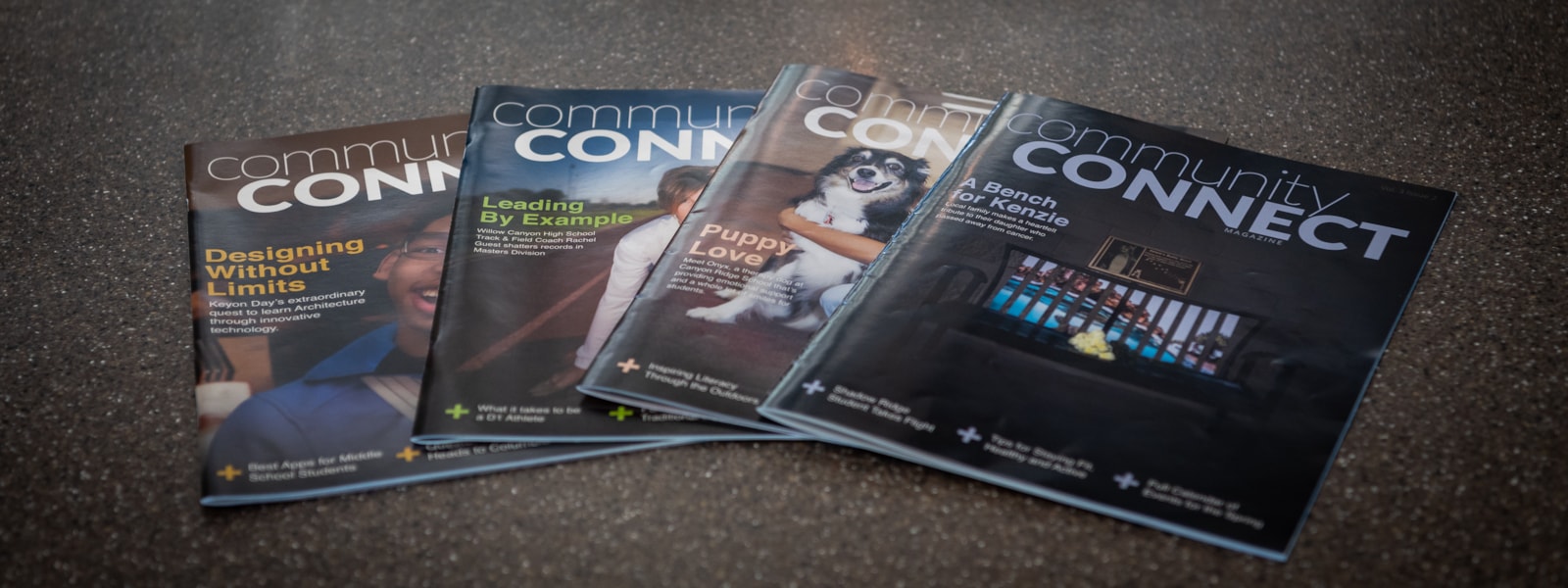 Community Connect Magazines laying on table