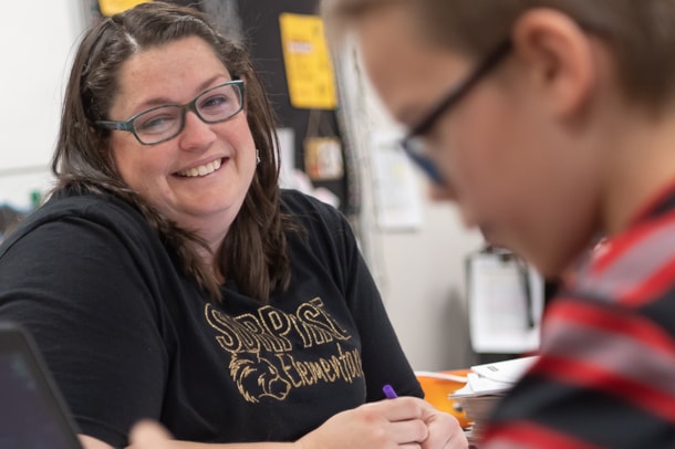 Special education teacher working with student