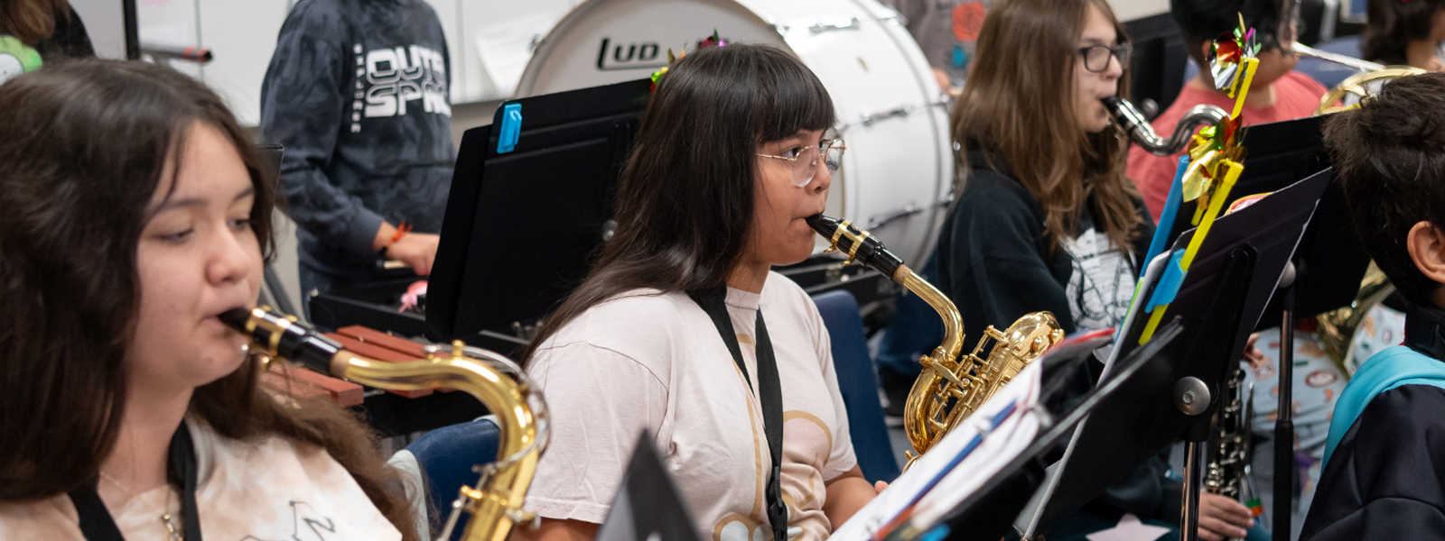 students playing woodwind instruments in band class