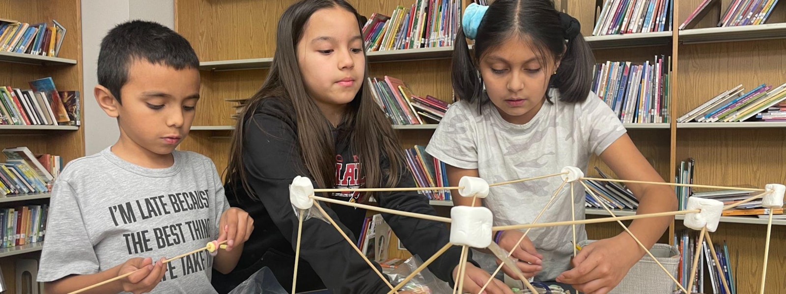 Students work on a STEM project in their club.