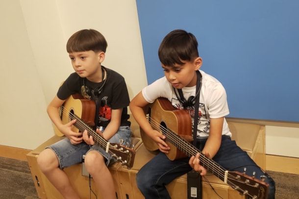 students playing guitar