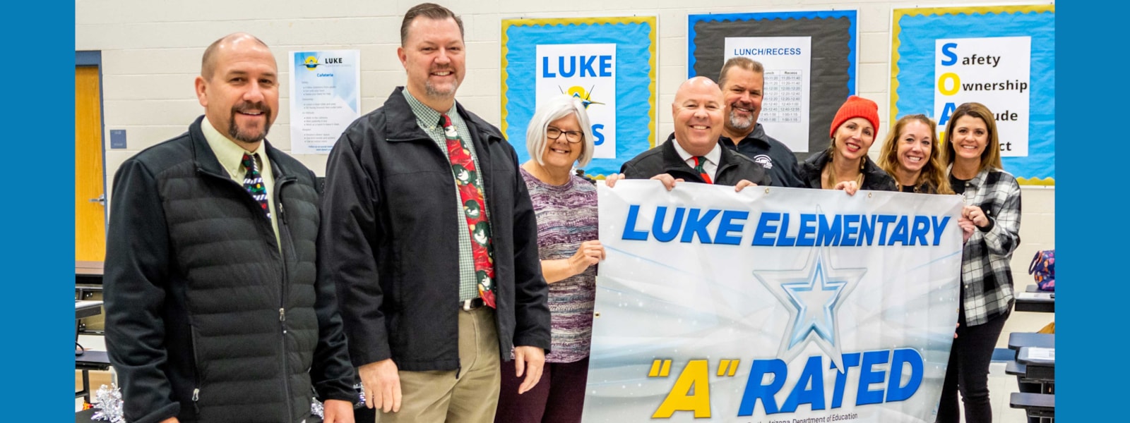 administrators with Luke "A" Rated Banner