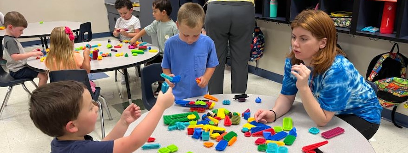 preschool students working at centers