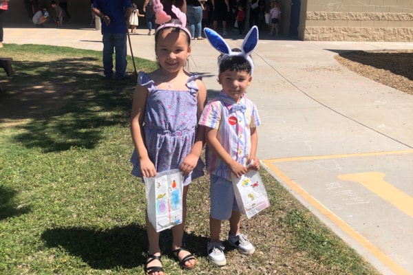 two students at the PreK Egg Hunt