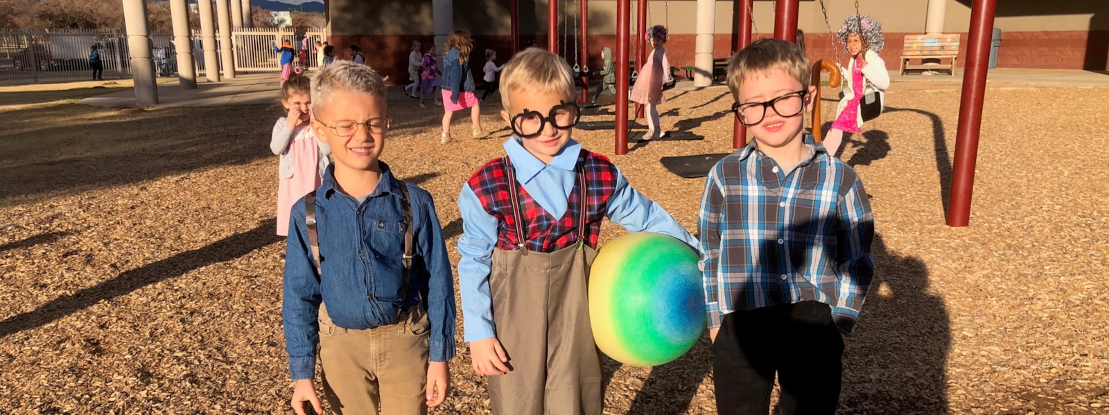 Kindergarten students dressed as they are 100