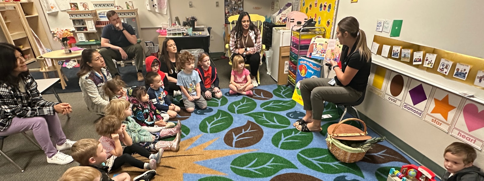 Preschool students listening to a read aloud