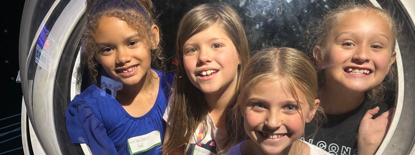 Four students at the Arizona Science Center