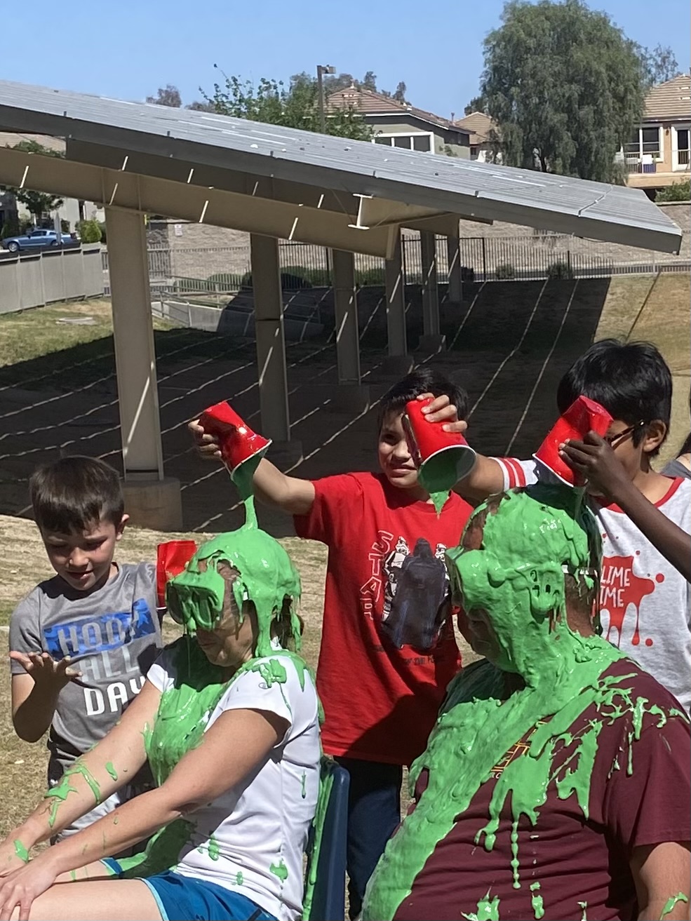 students dumping slime on the principals