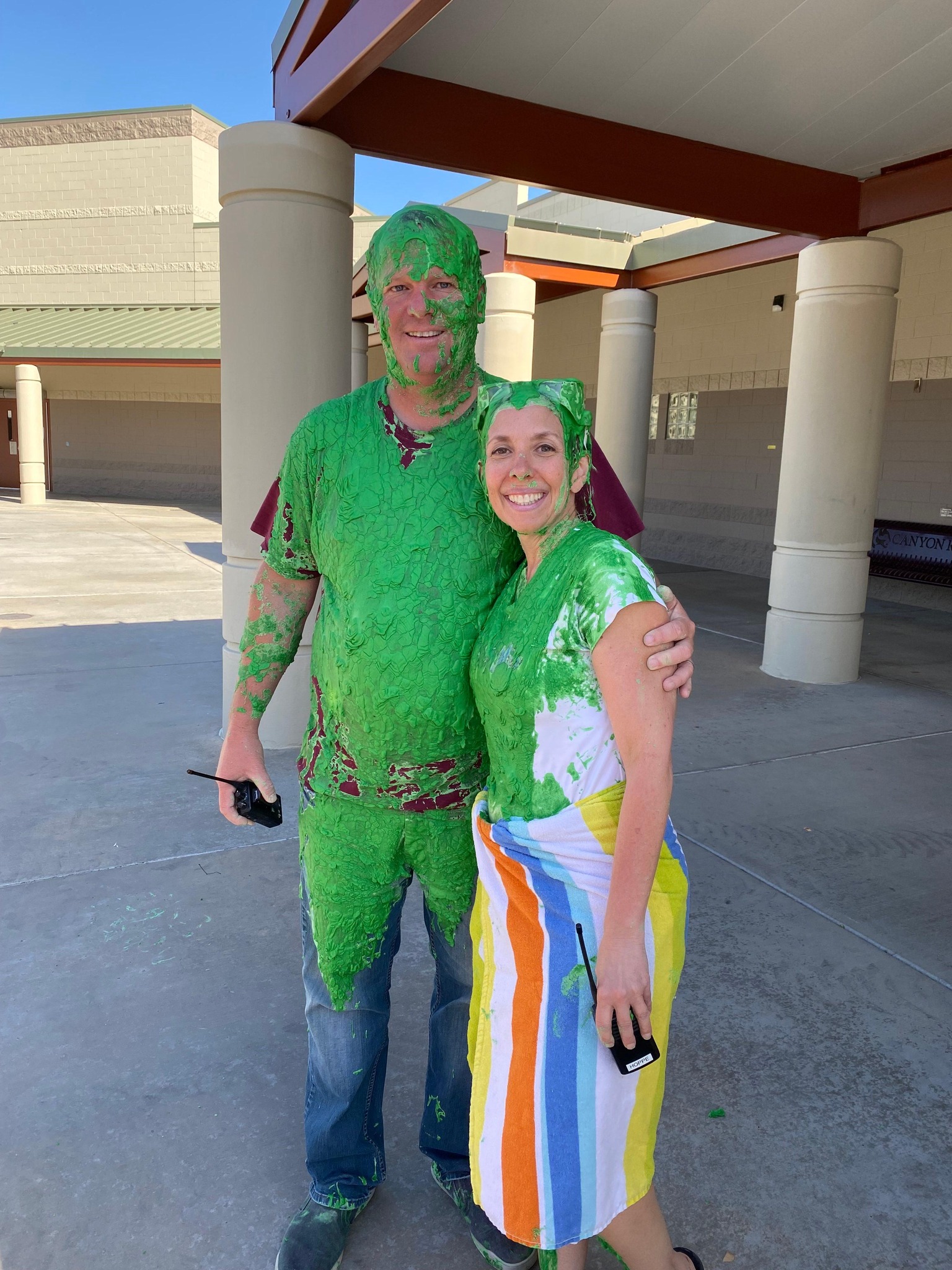 Principals standing with slime on them