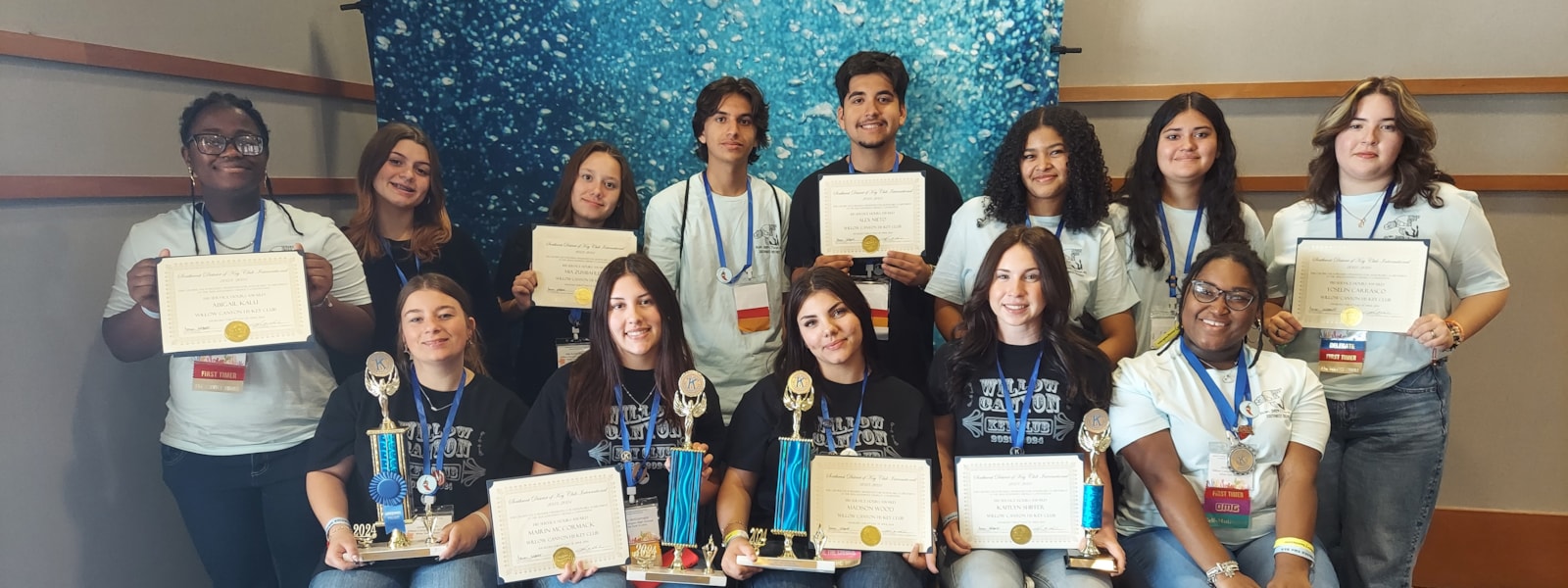Key Clun members with their trophies
