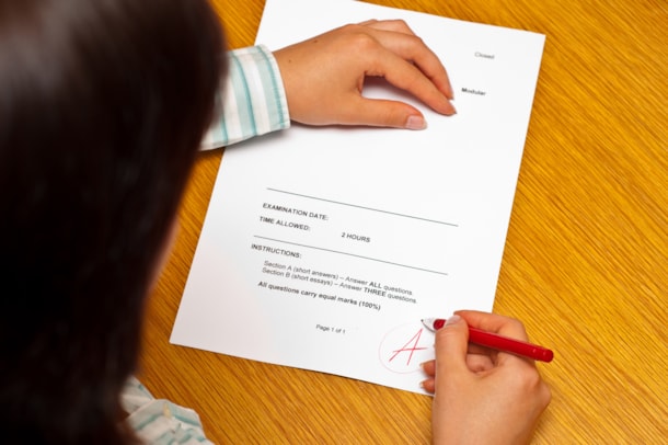 teacher grading paper