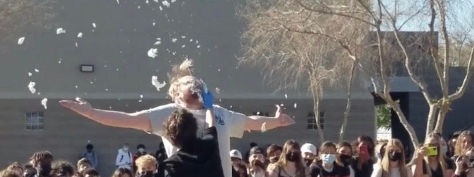 teacher getting a pie to the face