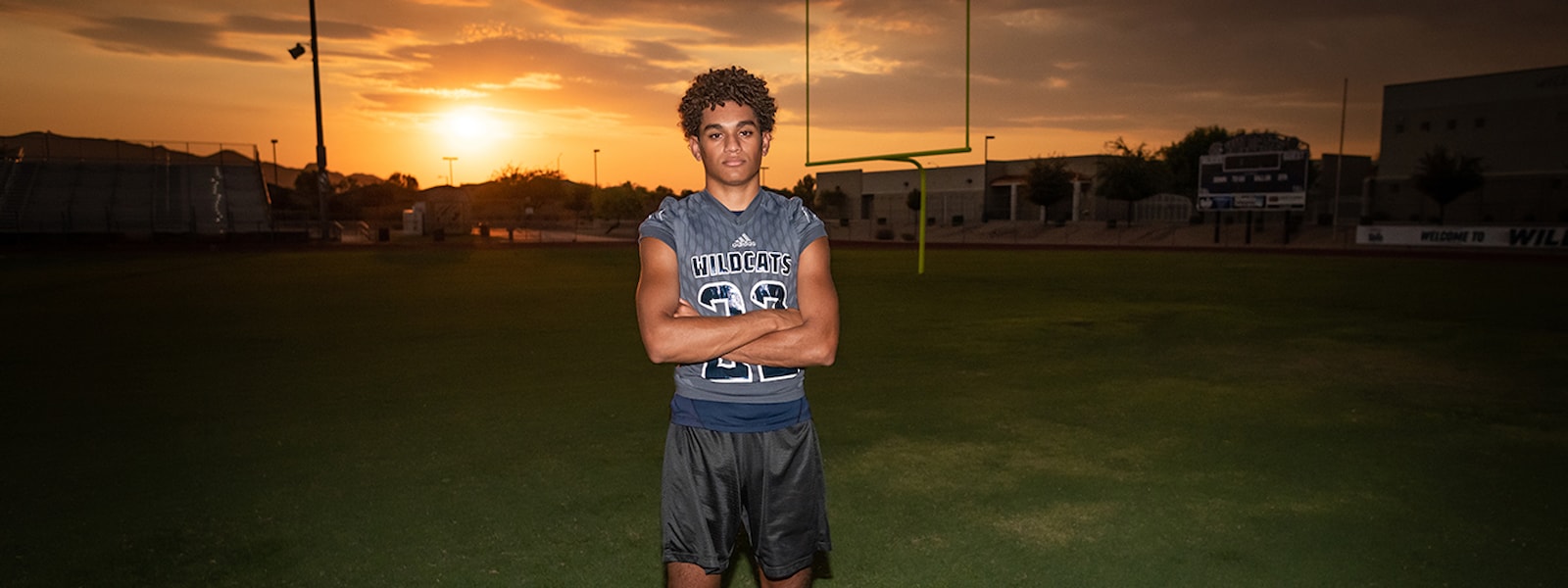 Dion Hafner poses for a photograph at sunset.