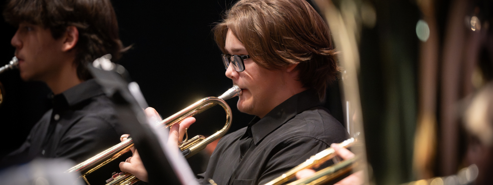 Trumpet player performing at a concert