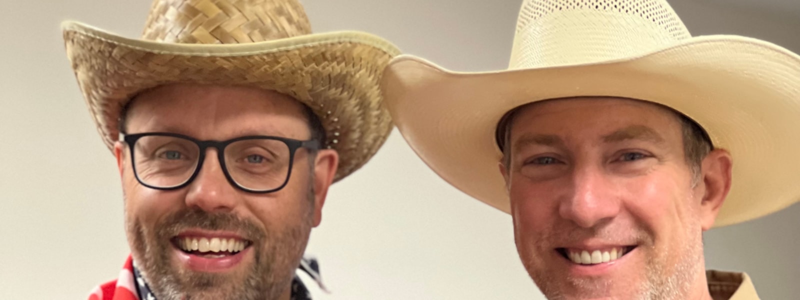 Picture of Mr. Moore and Mr. Offi wearing cowboy hats
