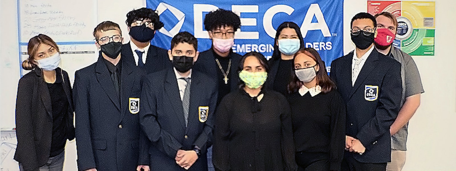 DECA students pose for a photo.