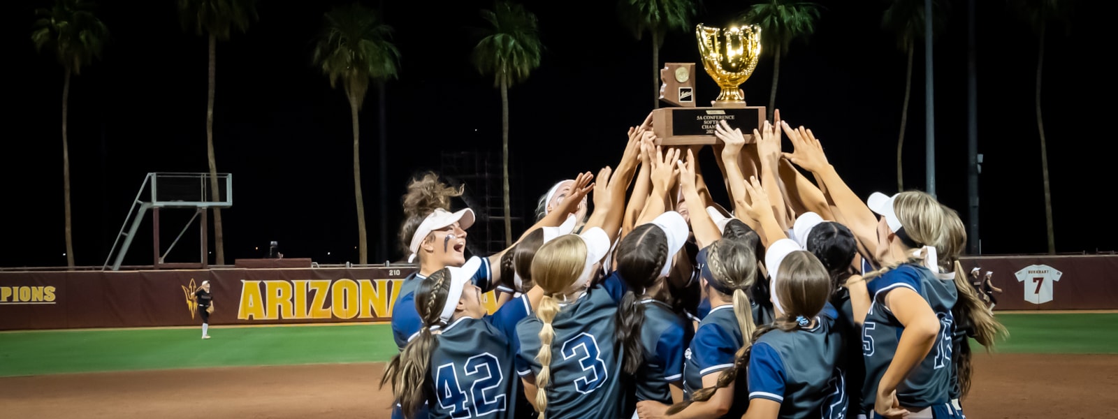 Willow Canyon softball team holds trophy