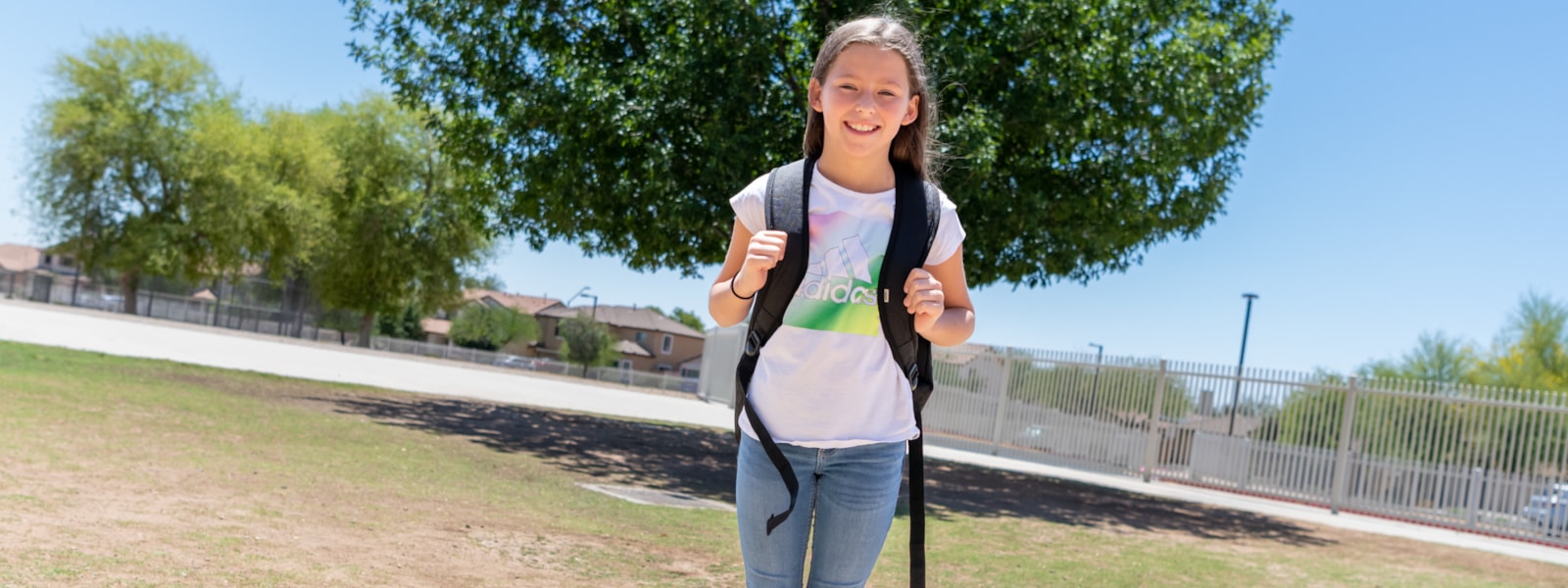 Student with backpack ready to enroll in school