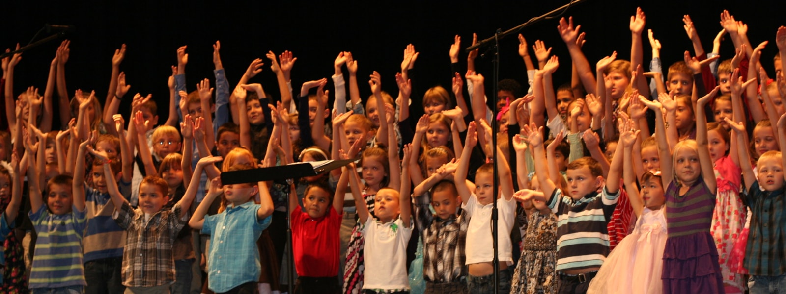 Students singing in choir. 