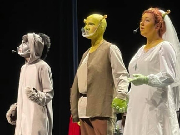 Students performing in Shrek. 